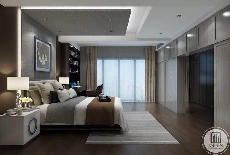 次卧空间感较大，但设计简约，为了营造出静谧的氛围，房间内更多采用了木质元素。木质的温润，能提升整个空间温馨的感觉。