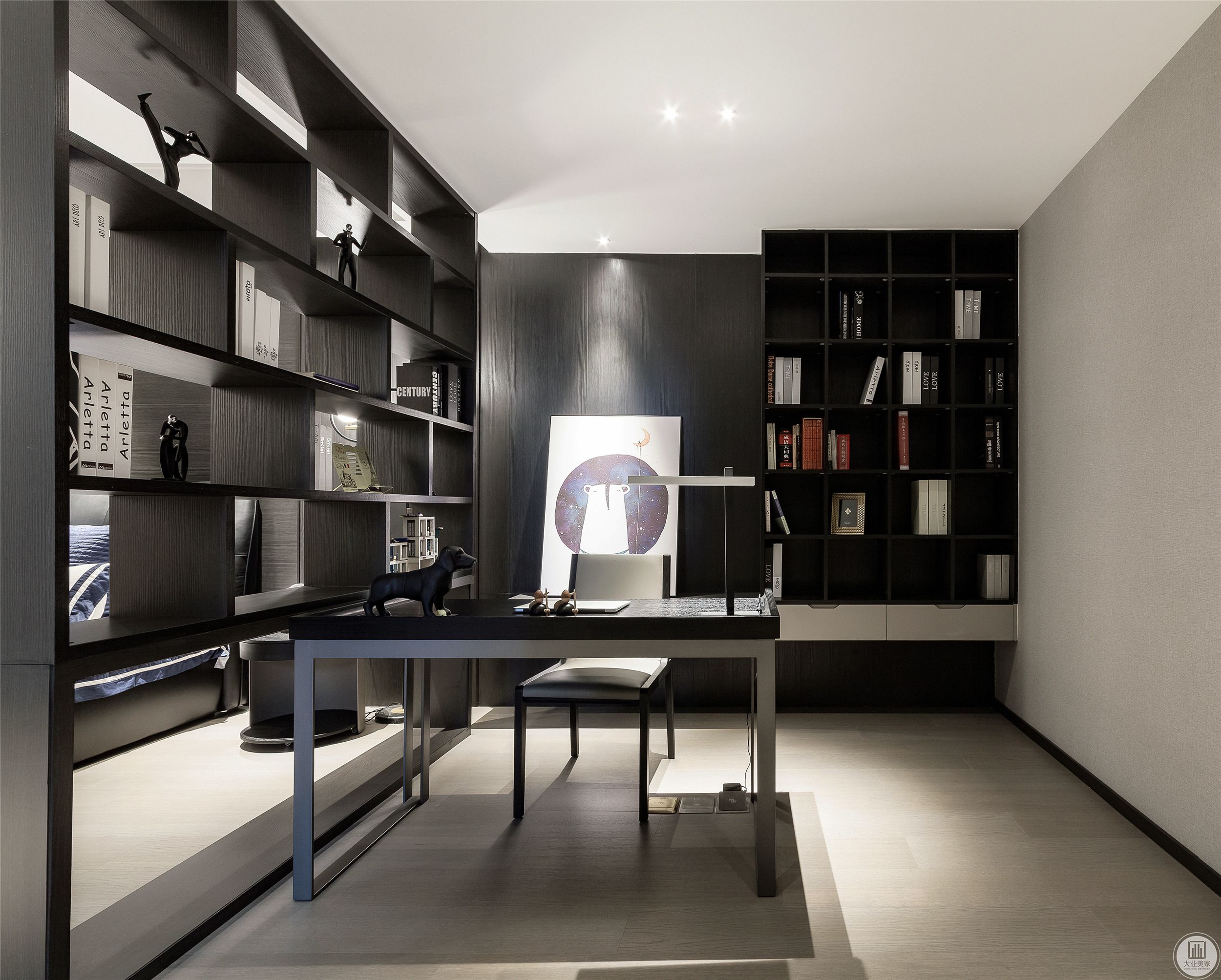 书房采用黑色实木书柜和书桌，整体统一协调，又以灰色地面作为搭配，整体呈现一种浓烈的现代感。